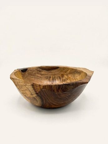 Hand-turned bowl with a natural live-edge rim